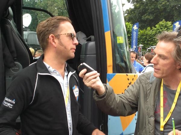 Jonathan Vaughters outside the bus