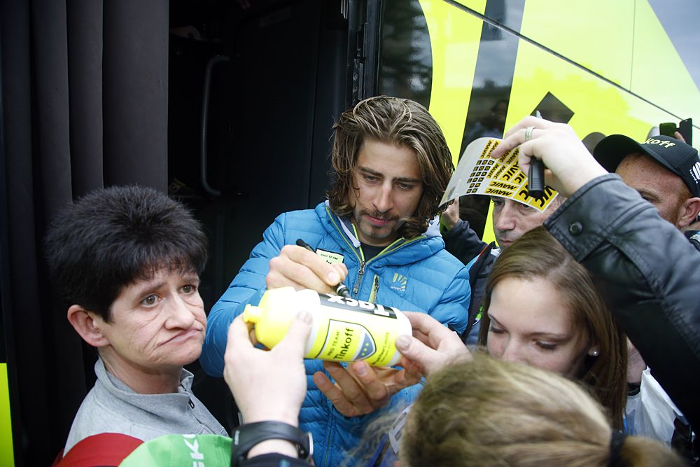 World champion Peter Sagan (Tinkoff) signs water bottles at the team presentation for Paris-Roubaix