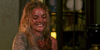 Samara Weaving laughing and covered in blood in Ready or Not