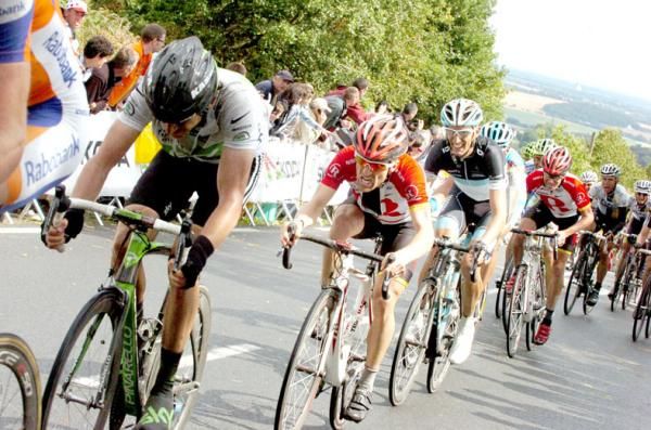 Andy Schleck (Leopard Trek) follows Levi Leipheimer and white jersey Geraint Thomas (Sky) in the final haul to the line.
