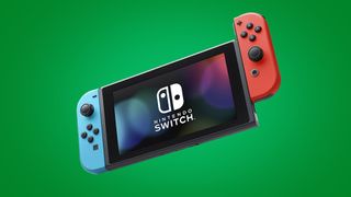 Nintendo Switch mot en grønn bakgrunn.