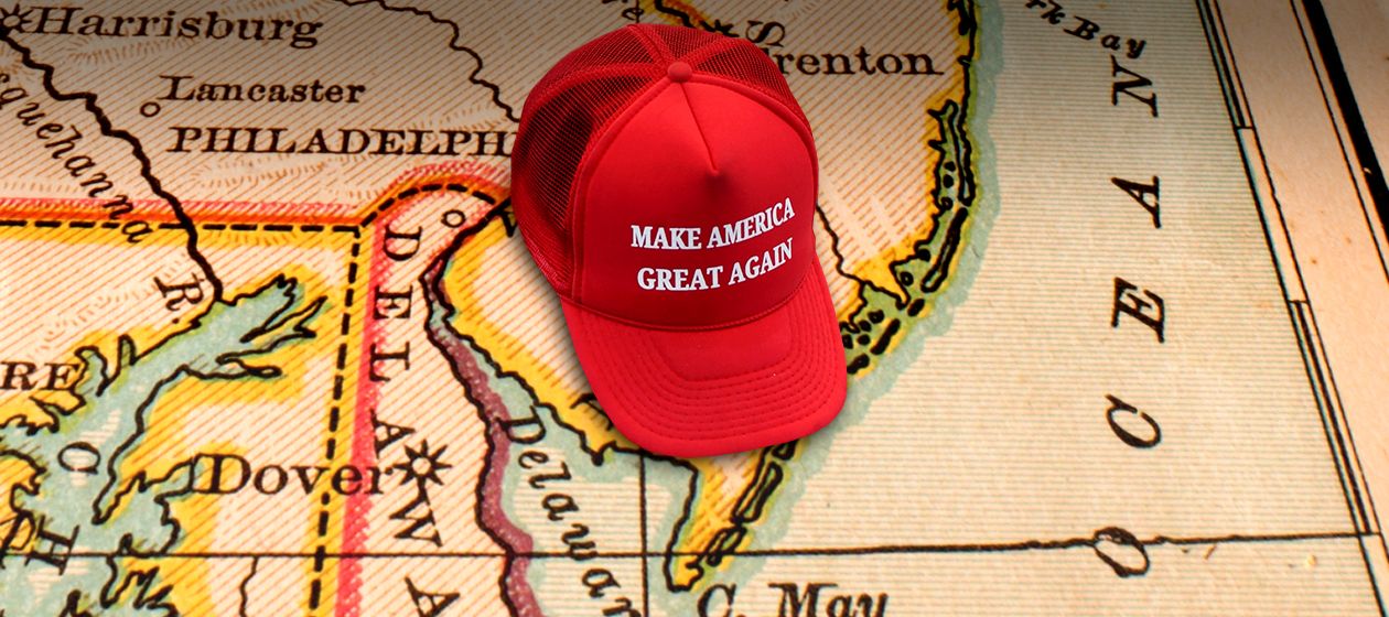 A MAGA hat on a map.