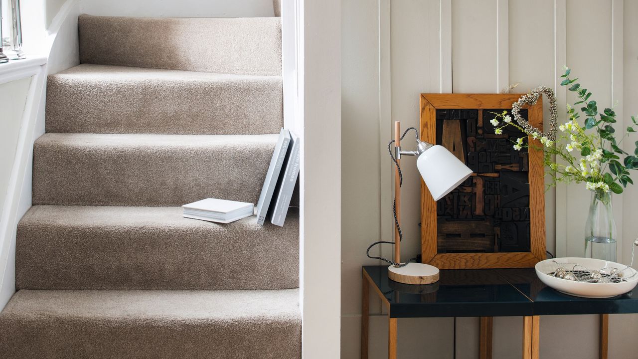 Hallway with wooden floor and carpeted staircase decorated in neutral colours