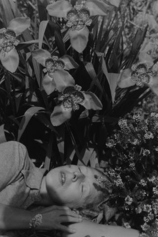 Claude Cahun, ‘Autoportrait aux orchidees’, 1939. Courtesy Alberta Pane and Patrice Garnier