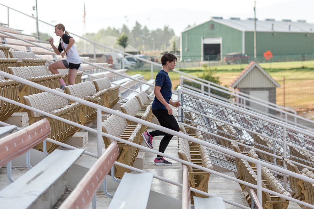 Campers run the stairs as part of their preparation