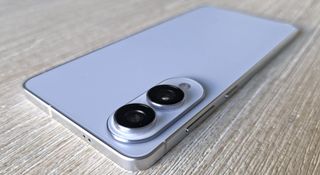 The Samsung Galaxy S25 lying on its face on a table