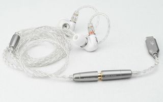 Meze Audio Alba wired earbuds on a grey background