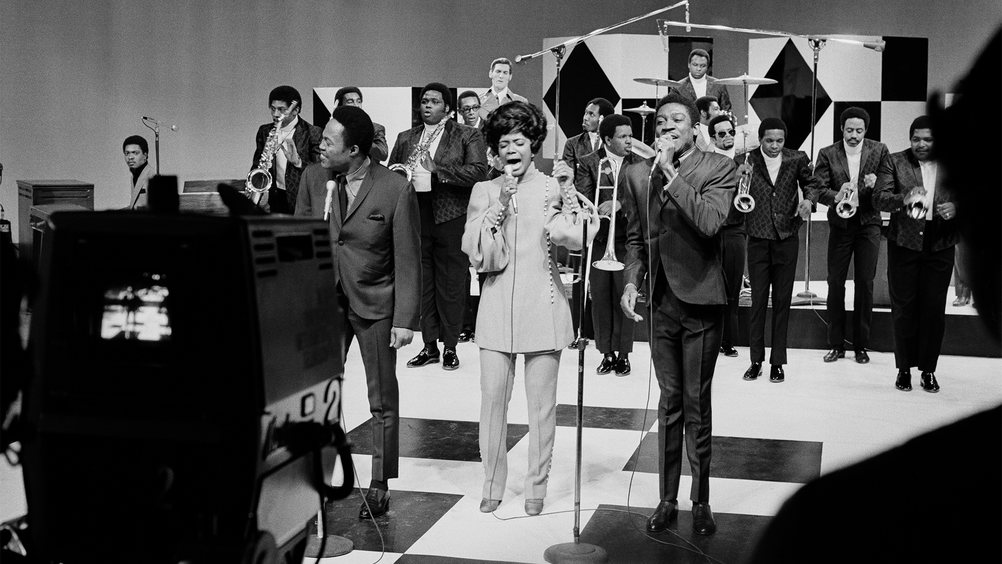 American soul singer Carla Thomas performs with duo Sam &amp;amp; Dave at the Stax Records &#039;Gettin&#039; It All Together&#039; television special in New York City, 20th March 1969. In the background are Booker T Jones and Steve Cropper of Booker T &amp;amp; the MG&#039;s. Stax are celebrating the release of 27 LPs and 30 singles.