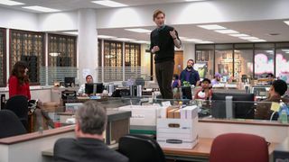L-R: Esmerelda (Sabrina Impacciatore), Oscar (Oscar Nunez), Ned (Domhnall Gleeson), Adelola (Gbemisola Ikumelo) in an office building in a scene from "The Paper" pilot episode.