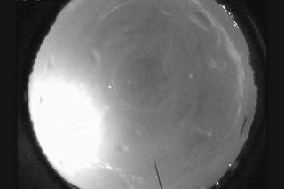 A bright flare in the lower left of the image marks the passage of a "fireball" over Alabama on Aug. 17.