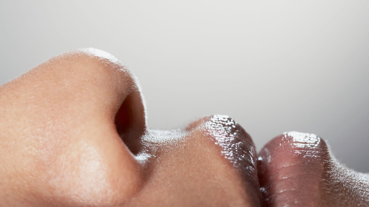woman's nose and lips close up