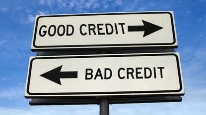 Road signs saying good credit and bad credit road signs pointing in opposite directions