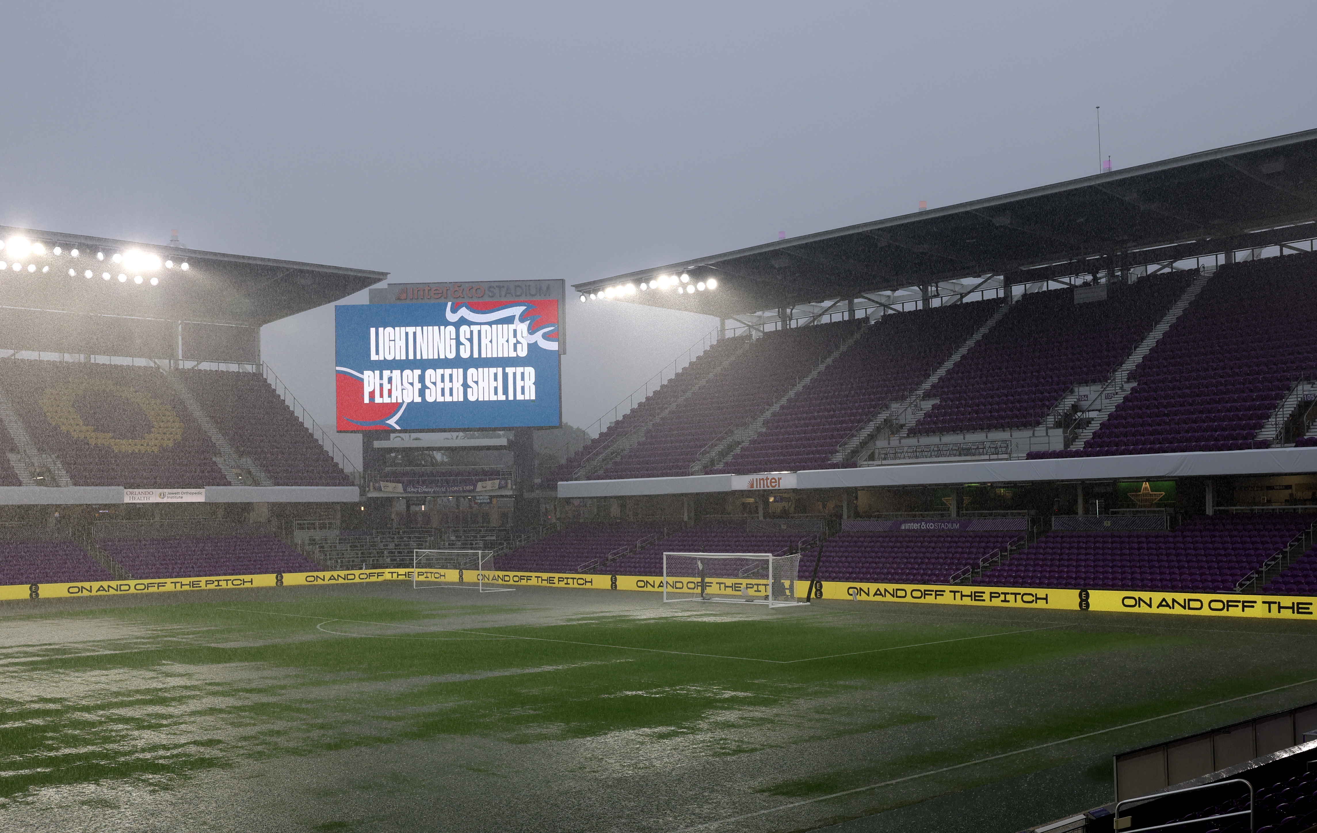 ORLANDO, FLORIDA - JUNE 10: A warning for lightning strikes appears on the big screen as heavy rain falls prior to the International Friendly match between England and Costa Rica at Inter&amp;amp;Co Stadium on June 10, 2026 in Orlando, Florida. (Photo by Eddie Keogh - The FA/The FA via Getty Images)