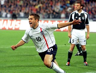 Michael Owen celebrates his second goal in England's 5-1 victory over Germany in Munich, September 2001.