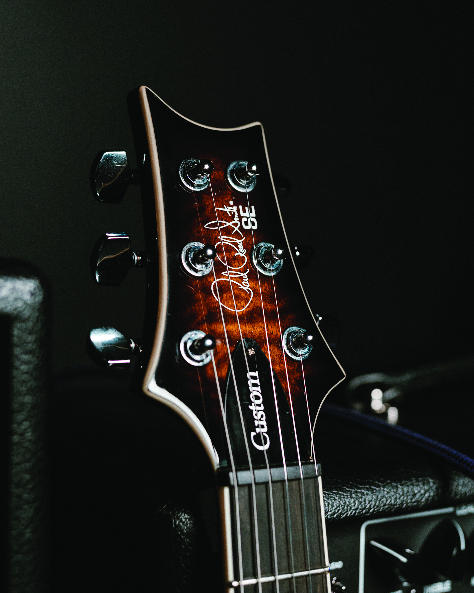 The headstock of the PRS SE Custom 24 Quilt