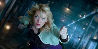 Gwen Stacy (Emma Stone) hangs from a web in The Amazing Spider-Man 2 (2014)