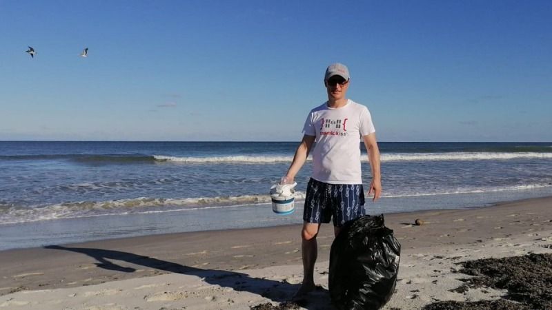 German Crew-3 astronaut Matthias Maurer, of the European Space Agency, poses with trash bags during a launch delay. Credit: Matthias Maurer/European Space Agency Twitter