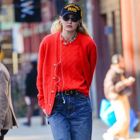 Gigi Hadid wears a charm necklace.