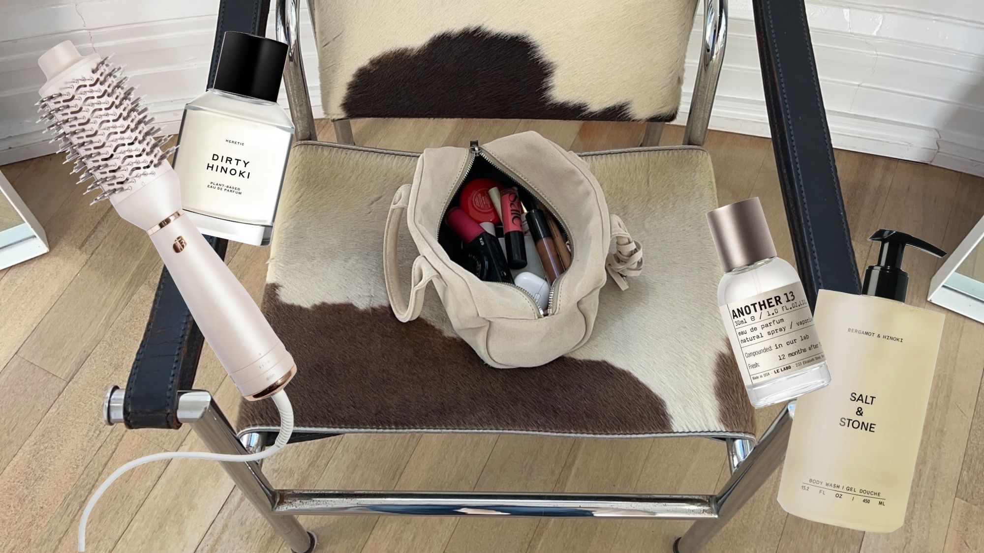 A makeup bag full of products open on a cowhide chair with beauty products available at the Nordstrom Anniversary Sale overlaid.