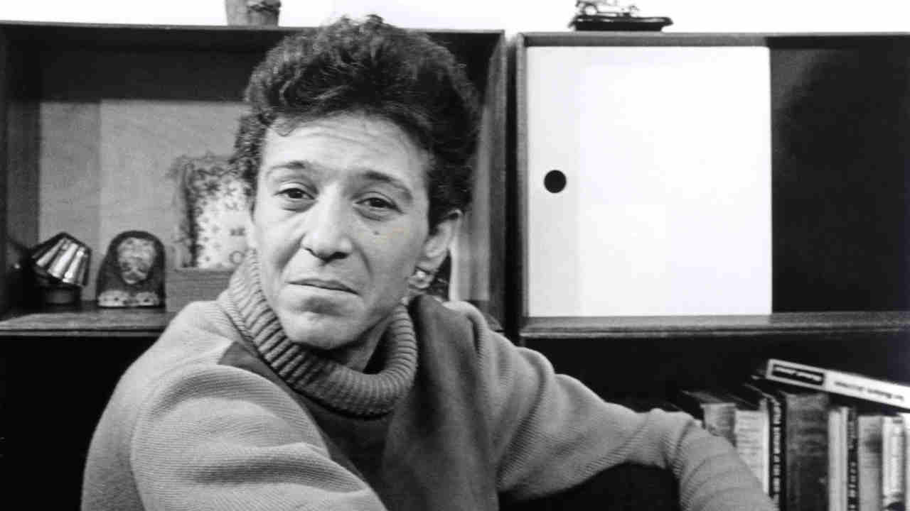 Alexis Korner posing for a photograph in the 1960s