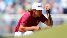 Cameron Smith lines up a putt