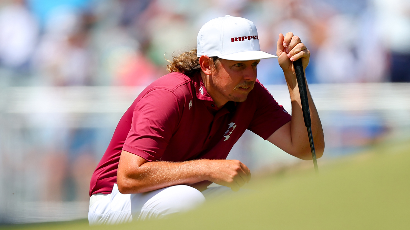 Cameron Smith lines up a putt