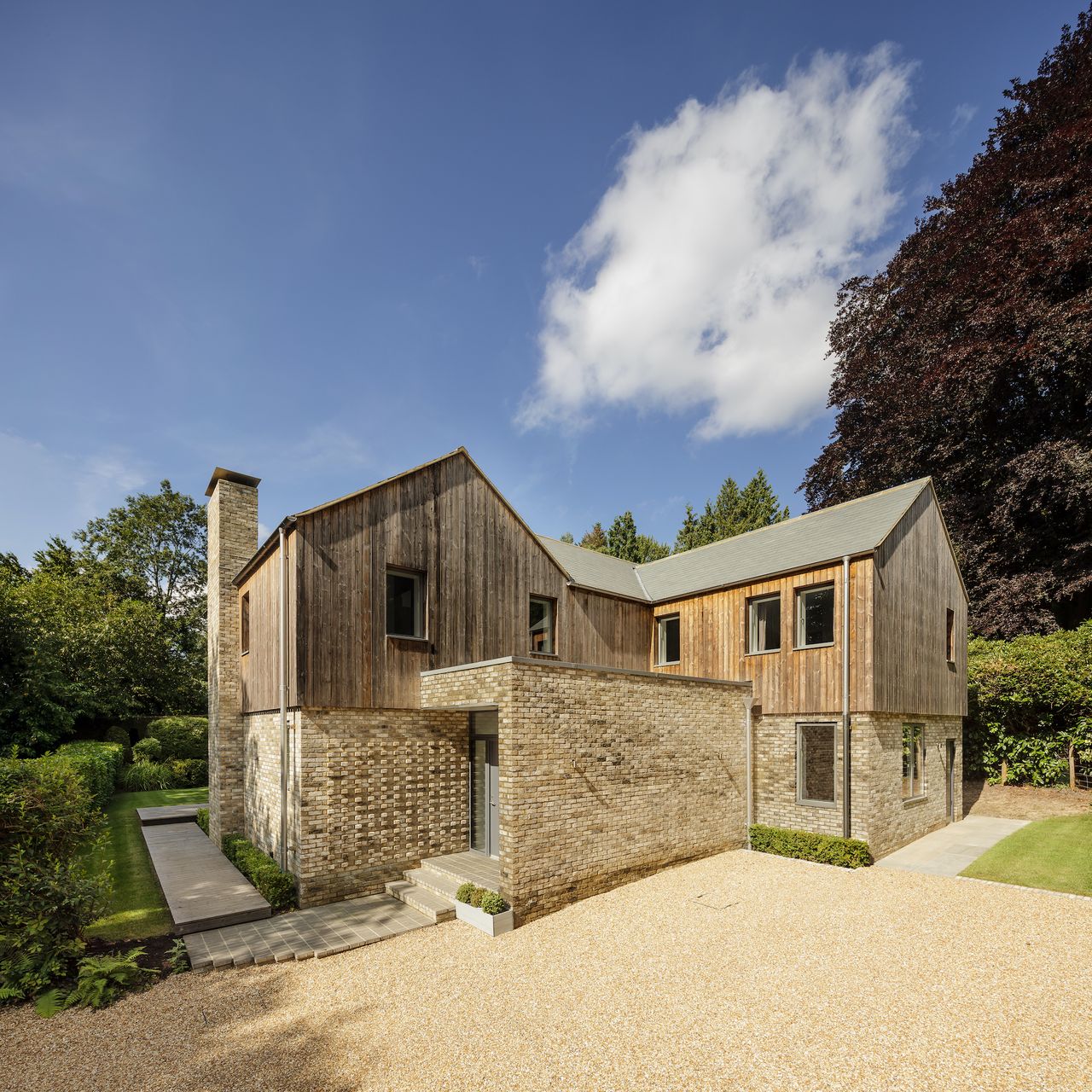 timber and brick self build with detailing