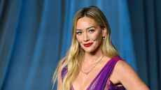 hillary duff on a blue background