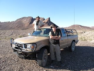 The stars of "Meteorite Men," Steve Arnold (left) and Geoff Notkin (right) are pictured with their truck, affectionately called "The Mule."