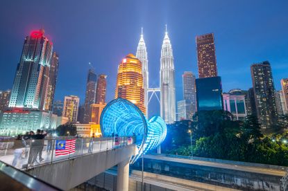 The capital of Malaysia, famous skyscrapers such as the Twin Towers (Menara Berkembar Petronas), nature, trees and big cities, saloma bridges, are popular with tourists. Malaysia, Asia.