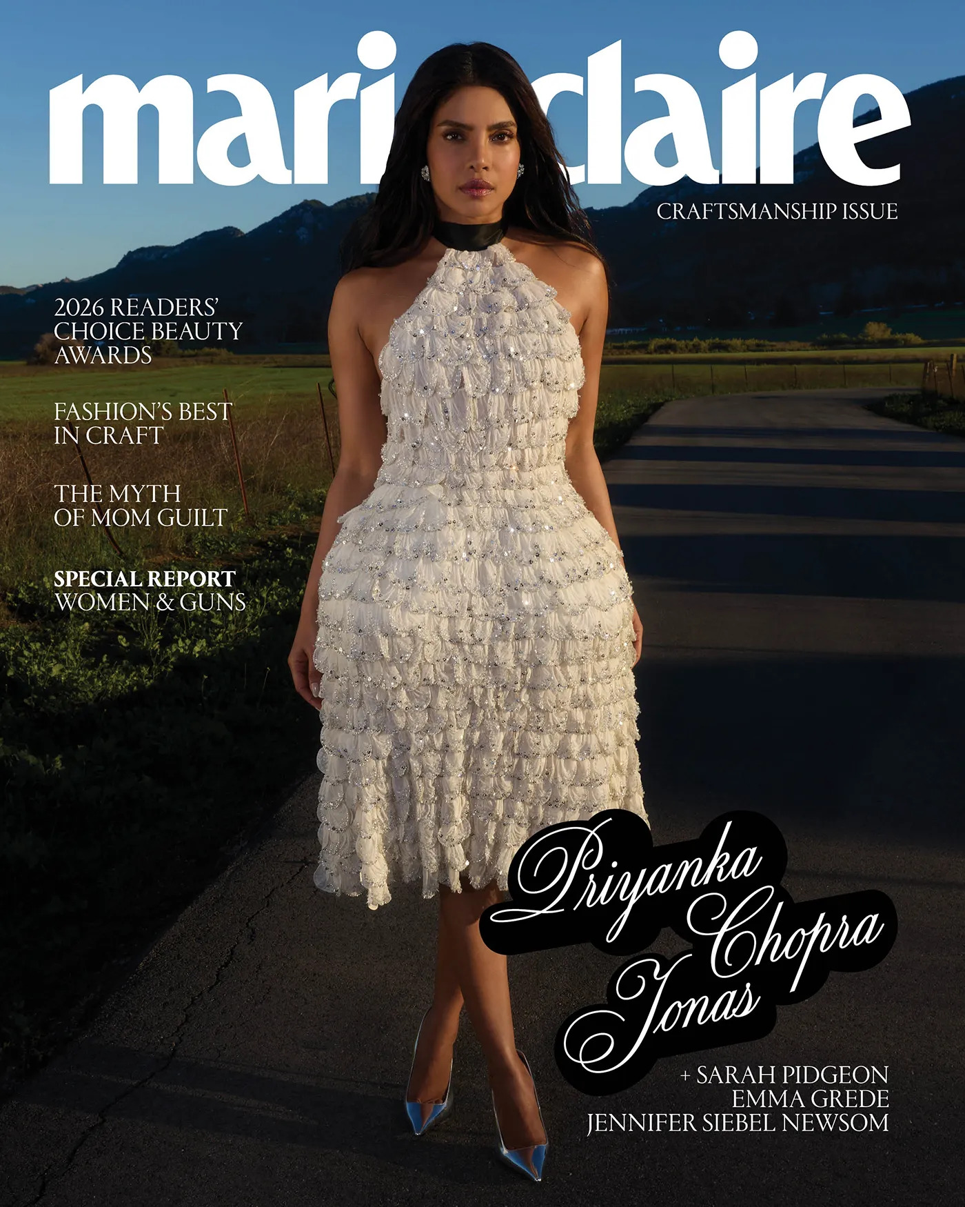 the cover of a magazine with a woman in a white dress with dark hair against a grassy backdrop