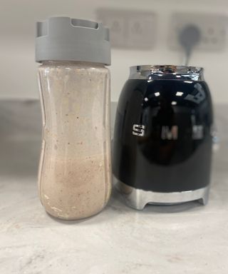 A strawberry and banana breakfast smoothie made in the Smeg PBF01 personal blender at Future Plc, Winnersh Triangle, Reading, UK