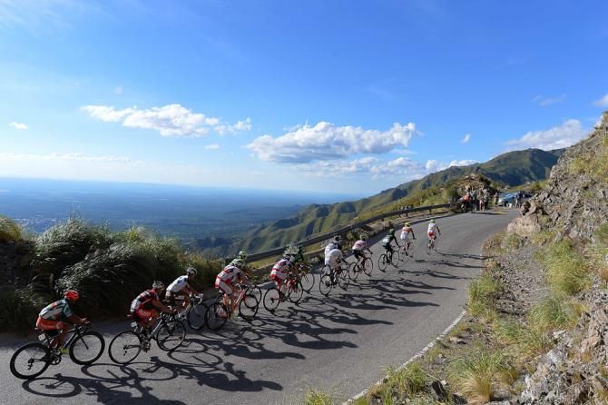 The peloton stretches out on the lower slopes of the climb.