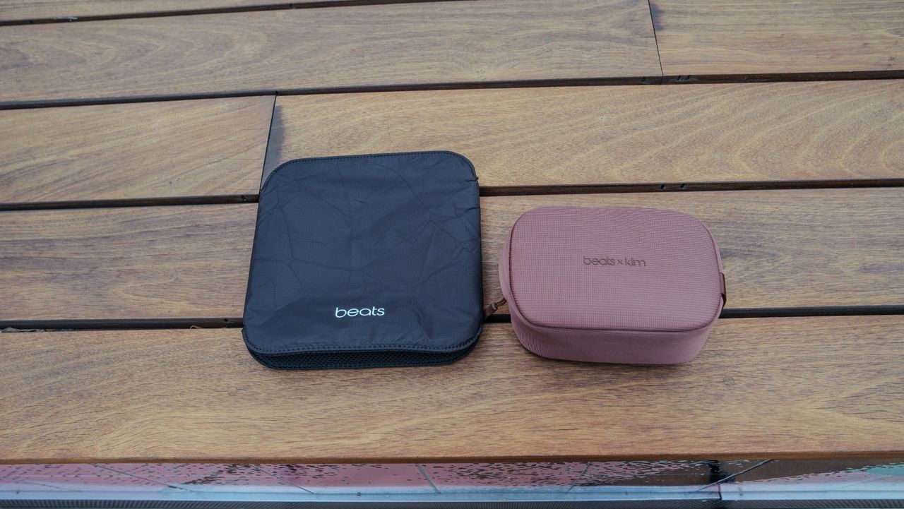 Beats 360 carrying case next to the Beats Studio Pro carrying case