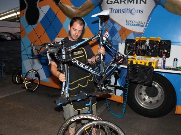 Inaki Goiburu mounts Tyler Farrar's bike on the repair stand to begin its servicing for the night.