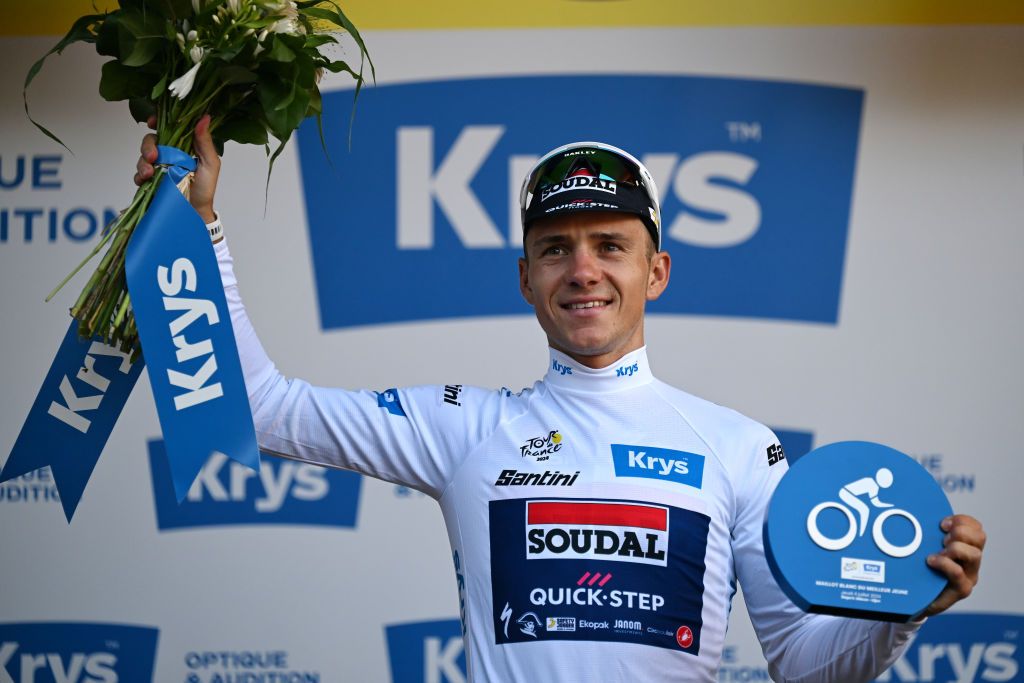 DIJON FRANCE JULY 04 Remco Evenepoel of Belgium and Team Soudal QuickStep celebrates at podium as White best young jersey winner during the 111th Tour de France 2024 Stage 6 a 1635km stage from Macon to Dijon UCIWT on July 04 2024 in Dijon France Photo by Tim de WaeleGetty Images