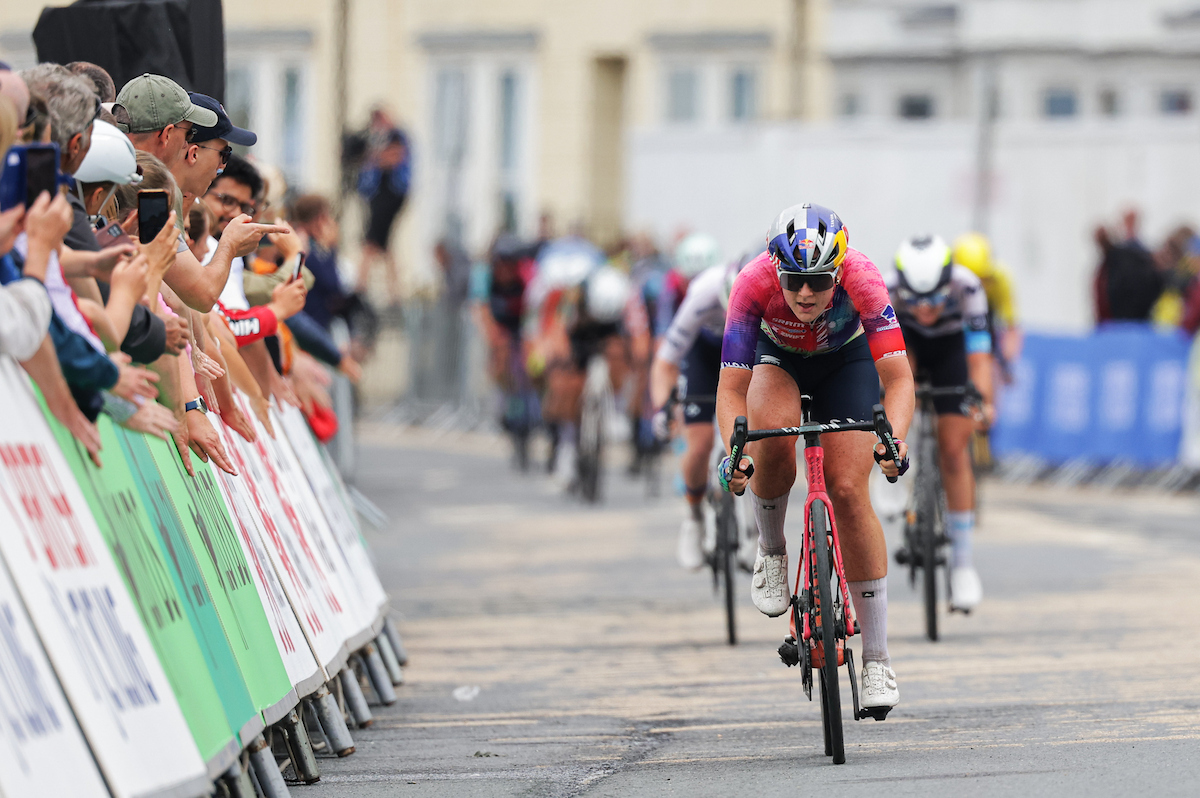 A woman leads out a pack of riders in wales