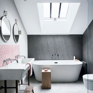 Bathroom with grey stone wall panels