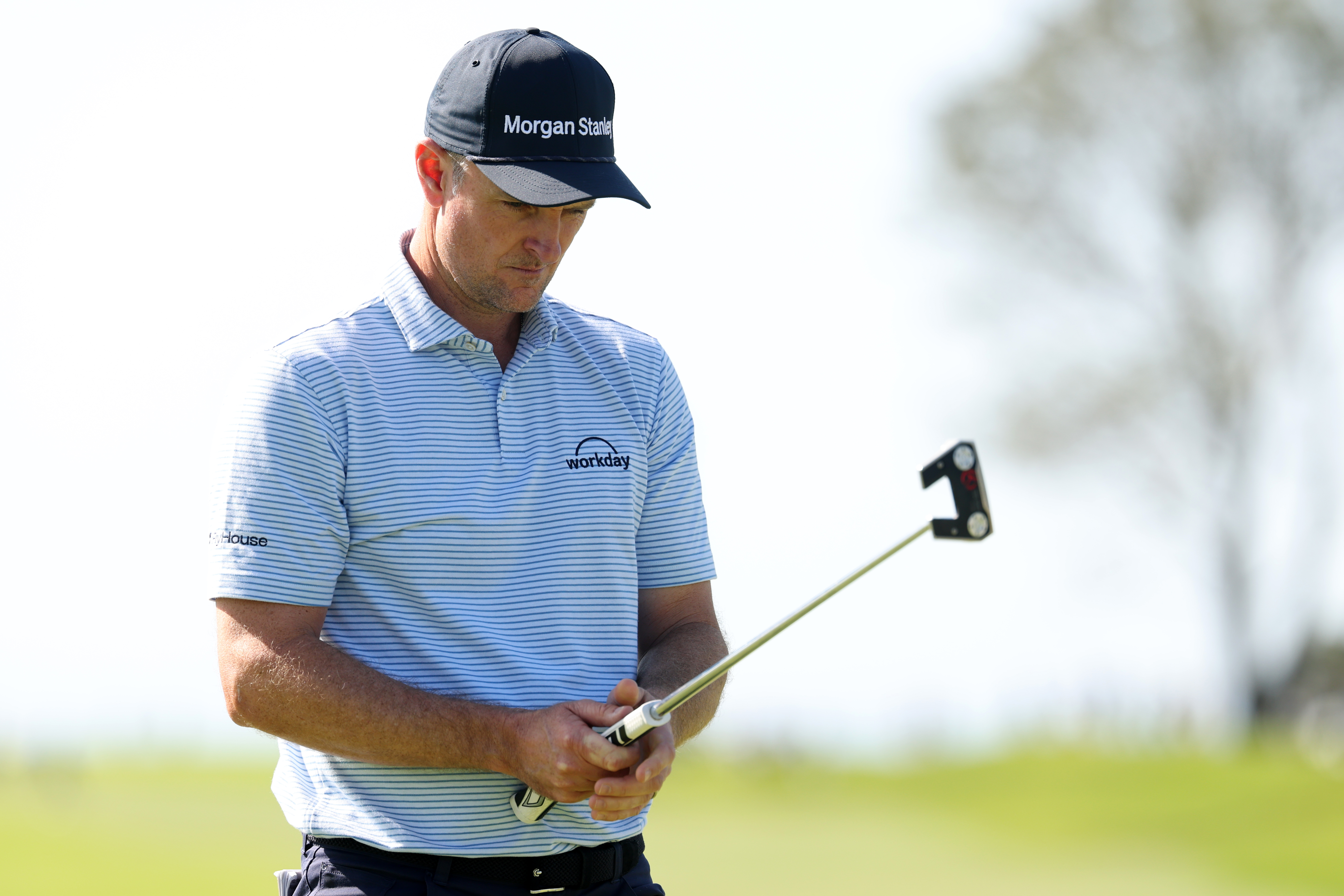 Justin Rose lines up a putt with his Scotty Cameron putter en route to winning the 2026 Farmers Insurance Open at Torrey Pines