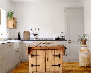 L-shaped kitchen with rustic island