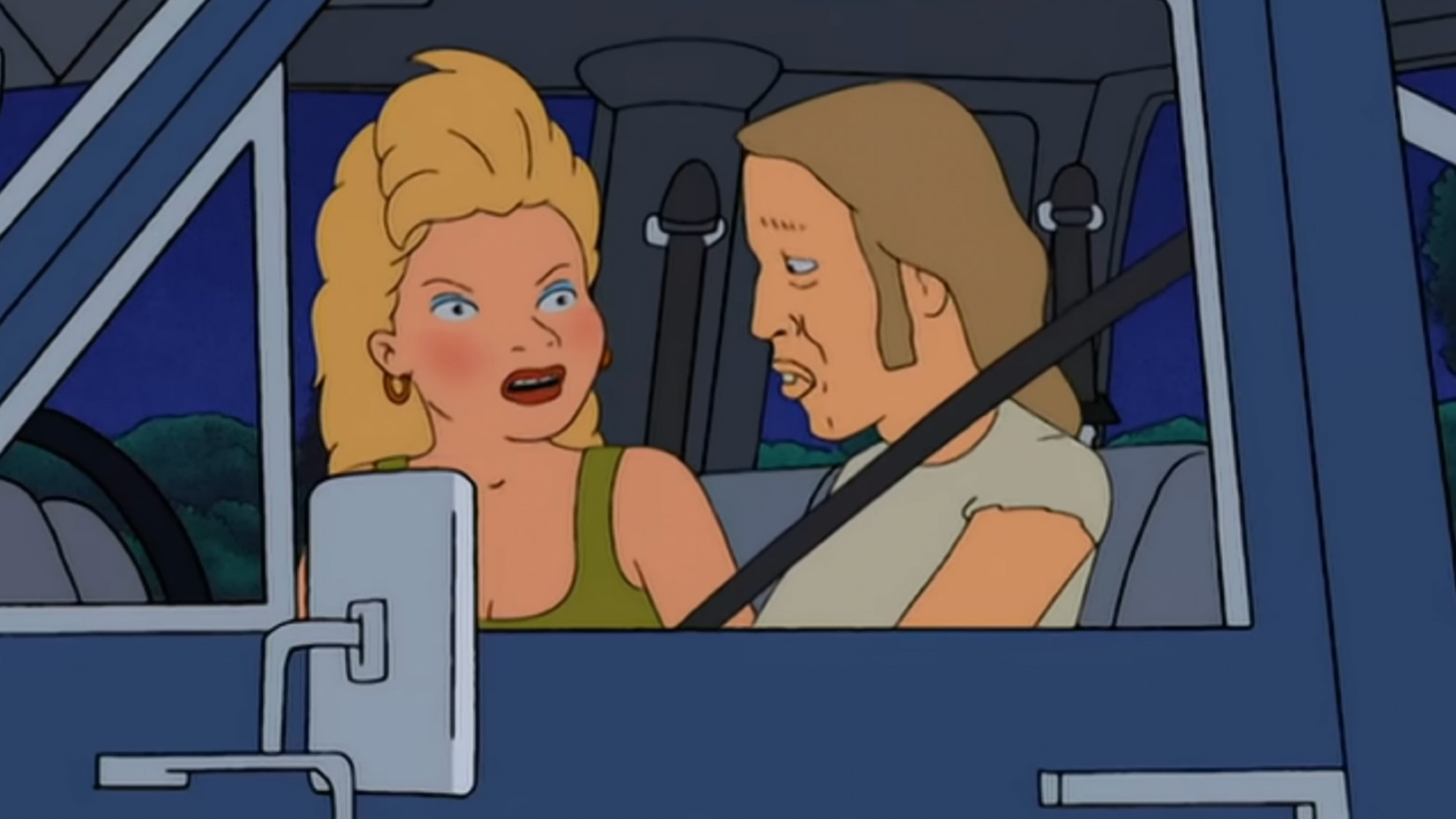 Angela and Lucky in the truck.