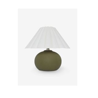 small lamp with green base and white pleated shade
