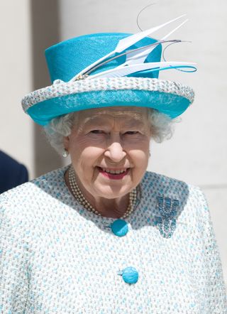 Queen Elizabeth II leaves after meeting with Irish Prime Minister Enda Kenny during a visit to Government Buildings on Merrion Street on May 18, 2011 in Dublin, Ireland. The Duke and Queen's visit to Ireland is the first by a monarch since 1911.