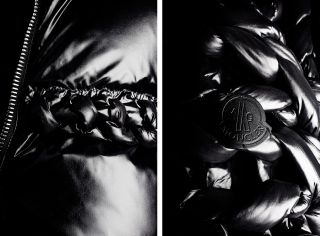 Close up monochrome detail of a Moncler badge and zip