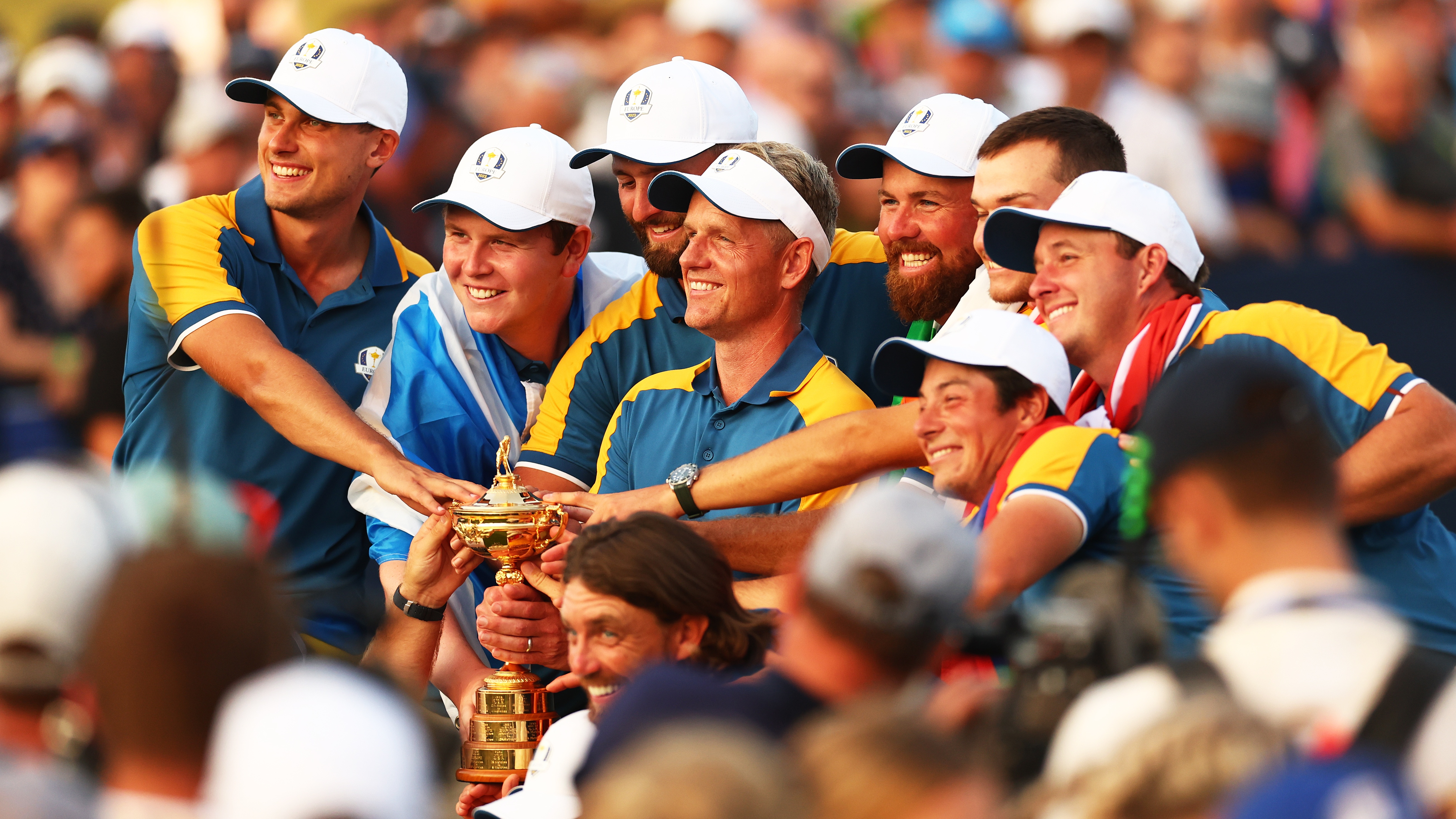 Team Europe captain Luke Donald lifting the Ryder Cup trophy with the rest of the team in Rome, Italy after their victory.