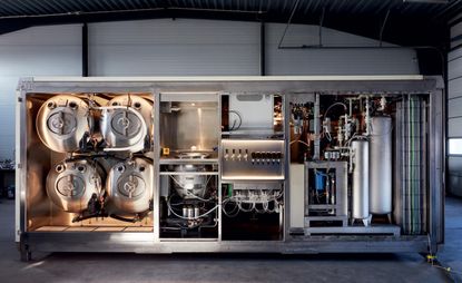 A microfactory being assembled in Linköping. Each unit can purify water, produce soft drinks, and work as a microbrewery. Units are finished with a choice of exterior panelling