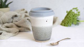 Libby Ballard Ceramic Hand-thrown Travel Cup in different tones of grey, one of w&h's best coffee travel mugs