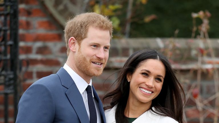 LONDON, ENGLAND - NOVEMBER 27: Prince Harry and actress Meghan Markle during an official photocall to announce their engagement at The Sunken Gardens at Kensington Palace on November 27, 2017 in London, England. Prince Harry and Meghan Markle have been a couple officially since November 2016 and are due to marry in Spring 2018. 