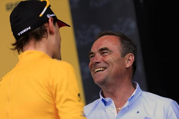 Five-time Tour de France champion Bernard Hinault congratulates Fabian Cancellara for another day in the yellow jersey.