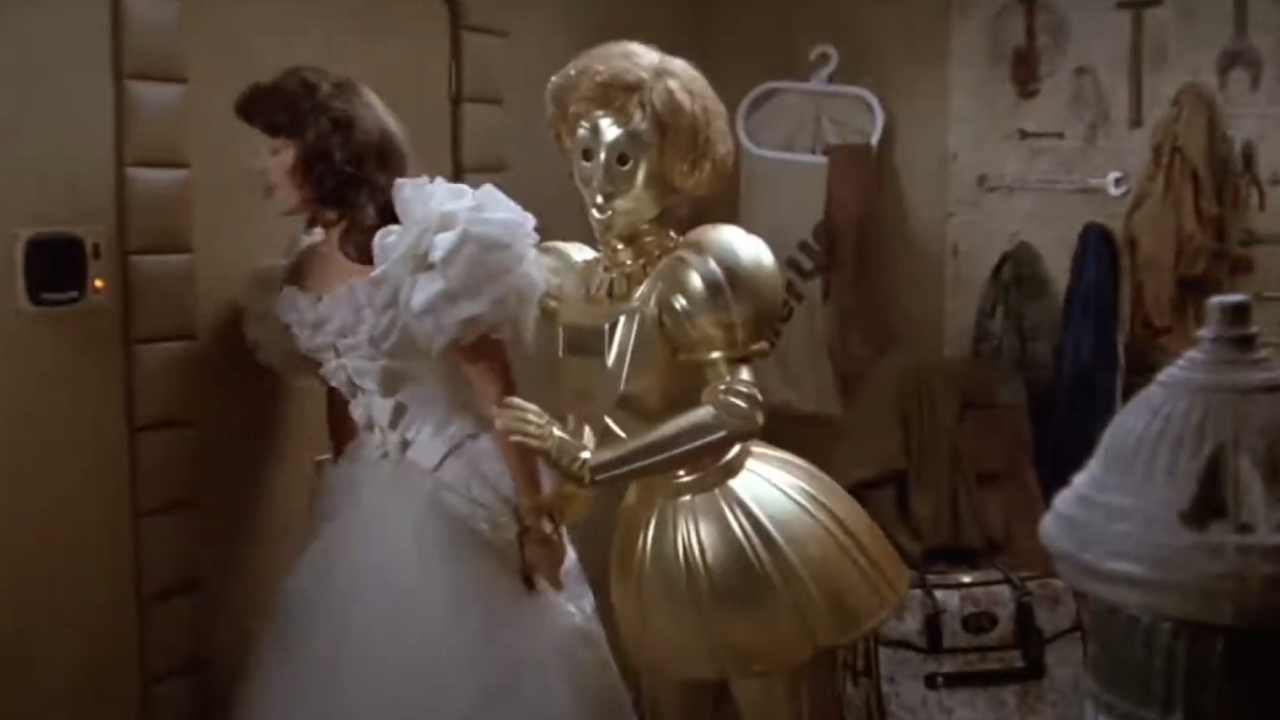Princess Vespa and Dot Matrix leaning against a wall in Spaceballs